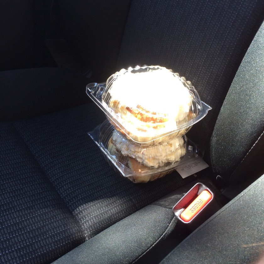 The best cinnamon rolls in the city taunting me from my car's passenger seat