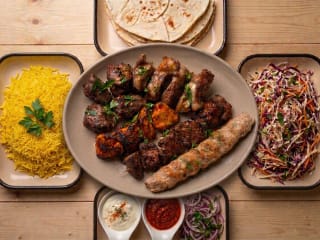 (1) Family Plate 3-4 People (3 Lula Koobideh Chicken, Lamb, Beef. 1 Chicken Thighs, 1 Lamb Kebab)