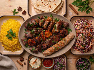(4) Family Plate 5-6 people (3 Lula Koobideh Chicken, Lamb, Beef. 2 Chicken Thighs Kebab. 2 Lamb Kebab)