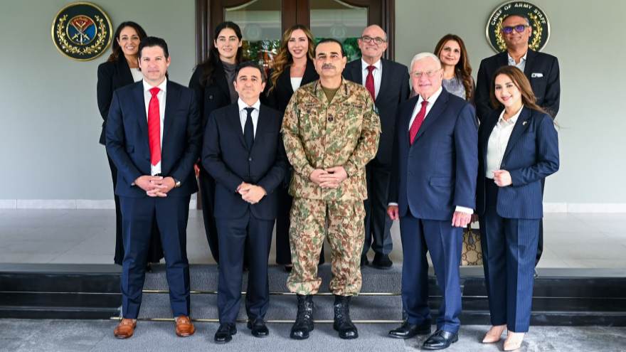 Field Marshal Syed Asim Munir stands with members of the POWERUS delegation at General Headquarters
