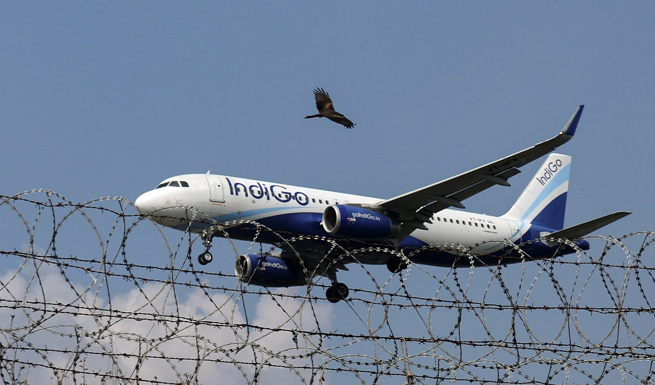 An IndiGo passenger aircraft approaches an airport in a file photograph