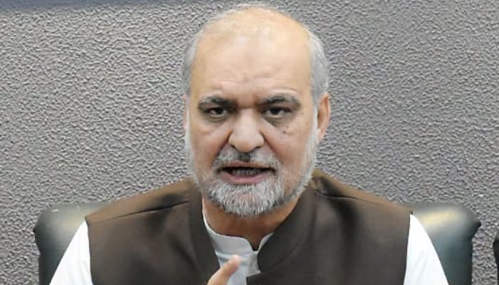 Jamaat-e-Islami chief Hafiz Naeemur Rehman addresses a press conference in Islamabad