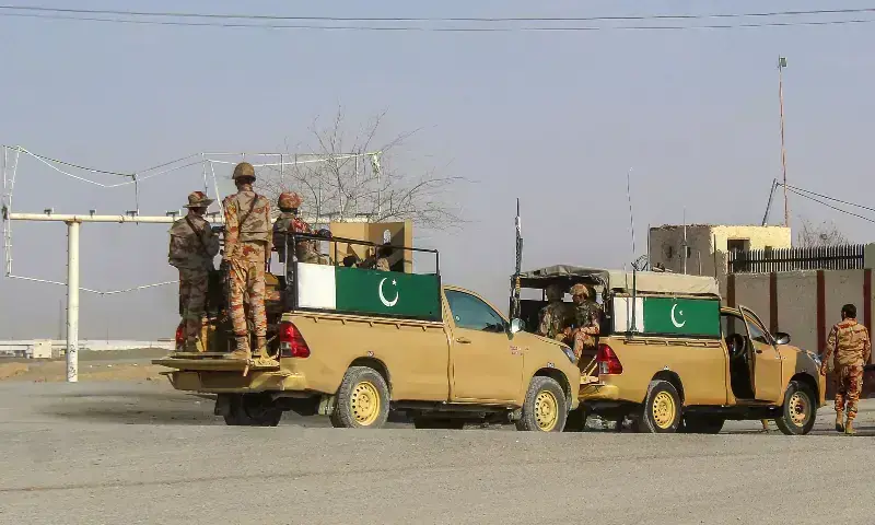 Pakistani soldiers patrol near the Pakistan-Afghanistan border in Chaman in a February 2026 file photograph