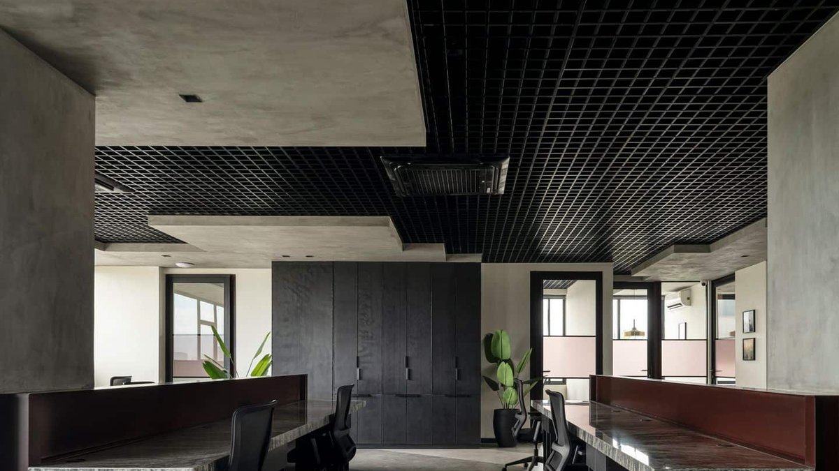 Studio Dashline designs raw industrial office in Bengaluru