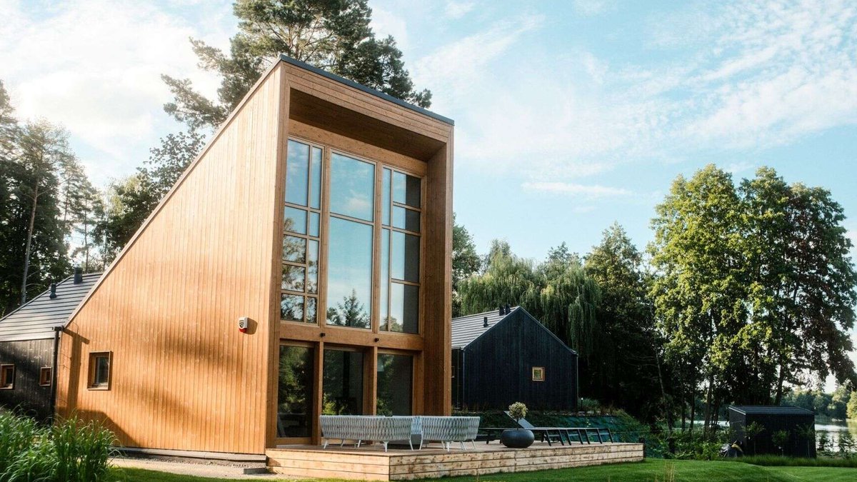 Poland's Lakeside Retreat Blends Modern Homes with Nature - modern homes