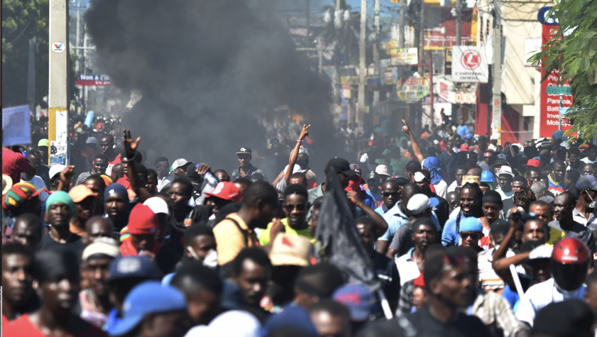 At Least 21 Haitians Dead After Men Dressed In Police Uniforms Massacre Port-au-Prince Neighborhood