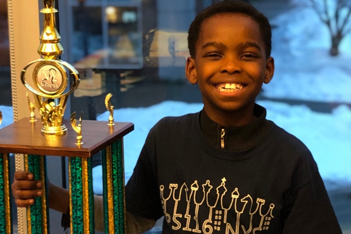 8-Year-Old Homeless Nigerian Refugee Wins New York State Chess Championship