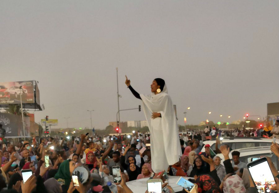 Viral Photo Captures 22-Year-Old Engineering Student Leading Sudanese Protest Against Nation's President