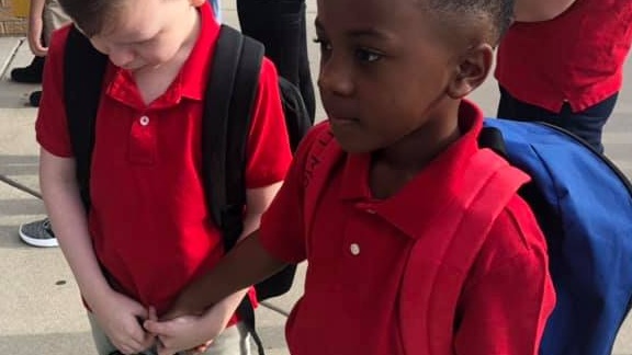 Heartwarming Photo Shows 8-Year-Old Kansas Boy Consoling Upset Classmate With Autism On First Day Of School