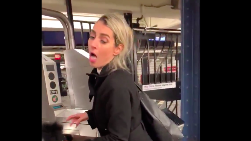 Video Shows Racist, Drunken White Woman Harassing Two Black Men In NYC Subway Station