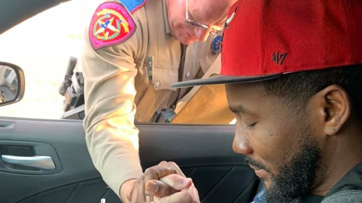 Touching Photo Shows State Trooper Offering Texas Couple A Prayer Instead Of A Ticket During Traffic Stop