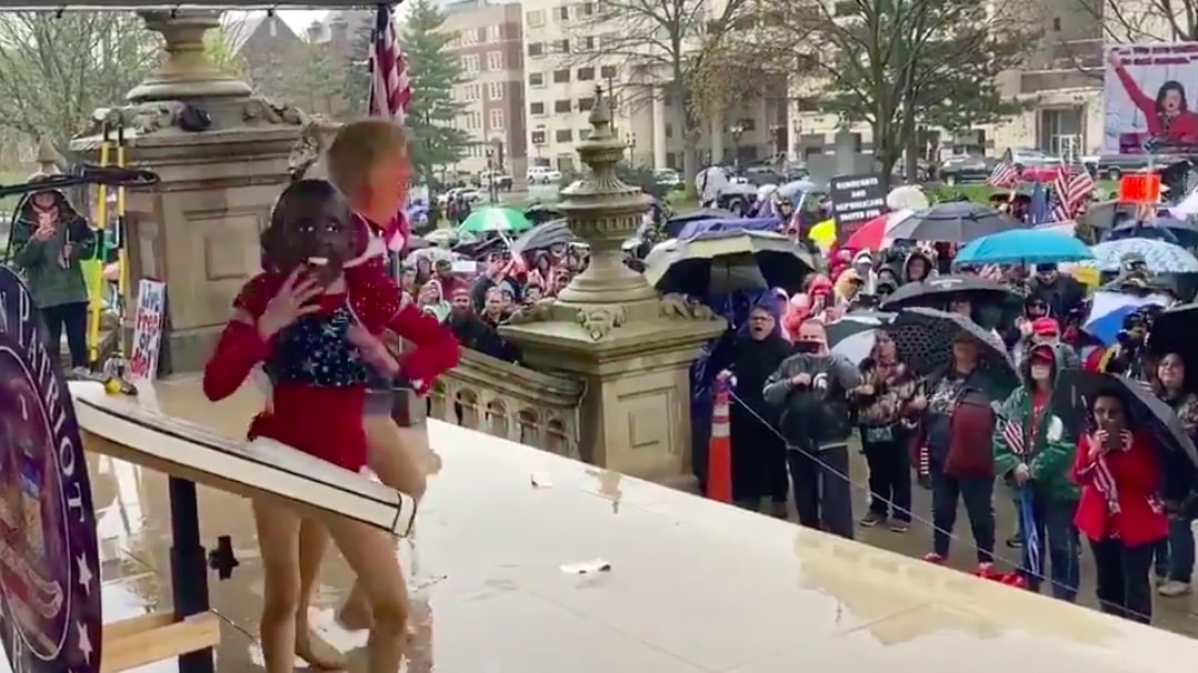 Little White Girl Wears Obama Mask During Strange Dance Performance At 'Reopen Michigan' Protest