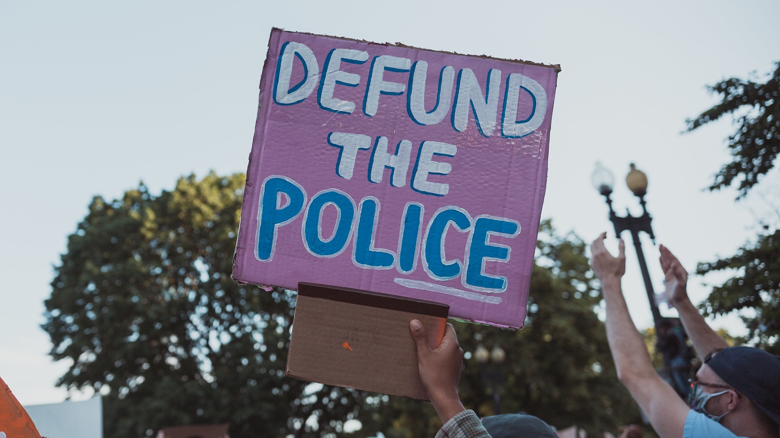 How Defunding The Police Helps To Defund Racism