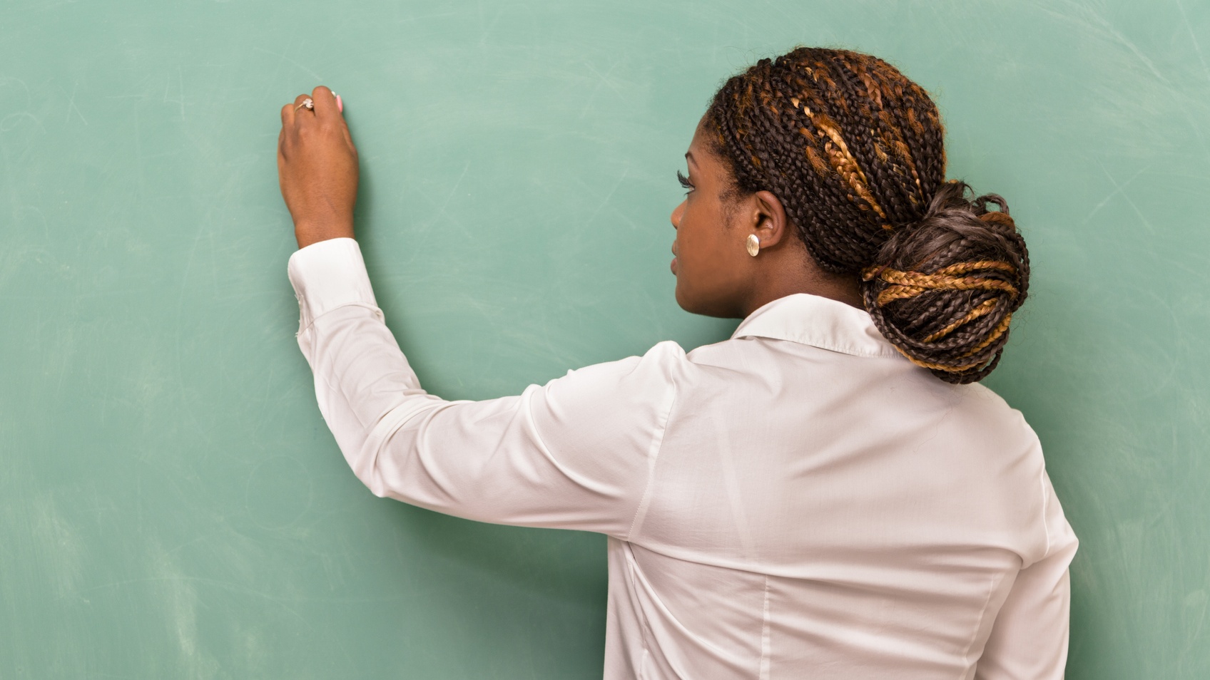 Professor Praised For Being 'True African Mother' After Carrying Student's Baby On Her Back So They Could Take Notes