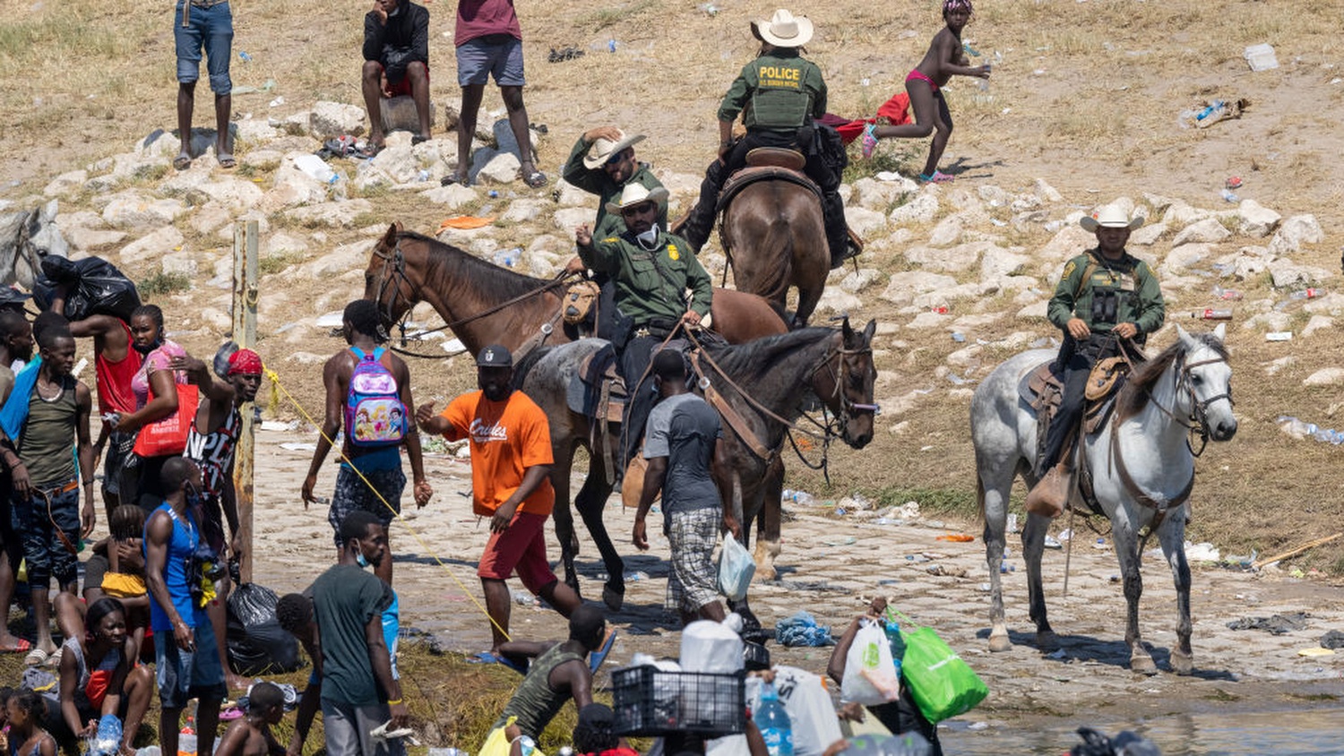 Border Patrol Agents Seen Holding Apparent Whips While Preventing Haitian Immigrants From Border Crossing