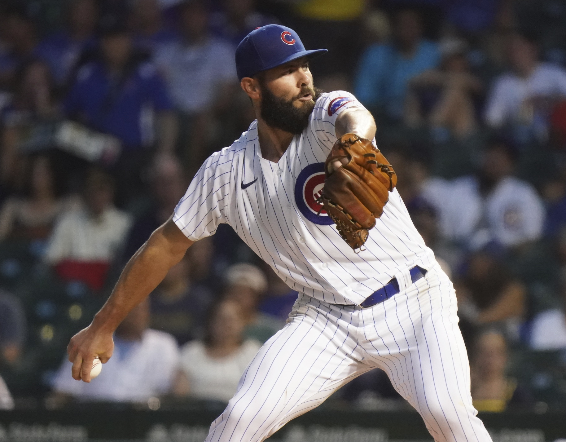 Arrieta beats former team, pitches Cubs over Orioles