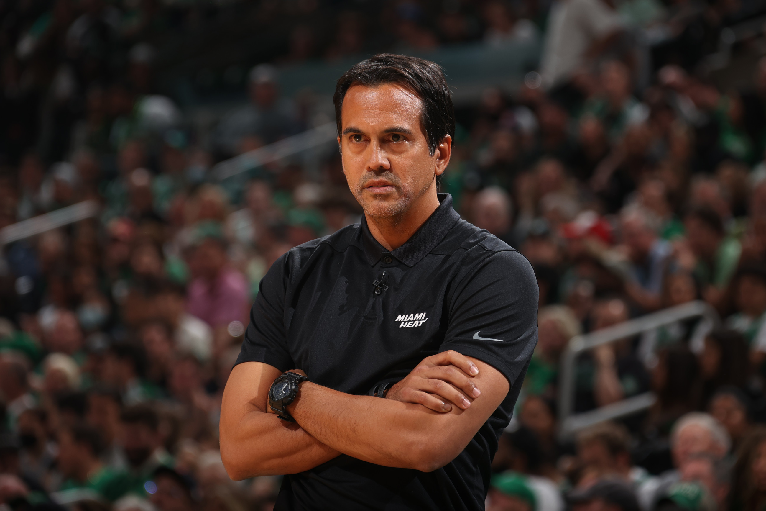 Miami Heat head coach Erik Spoelstra, right, presents a 2011-12