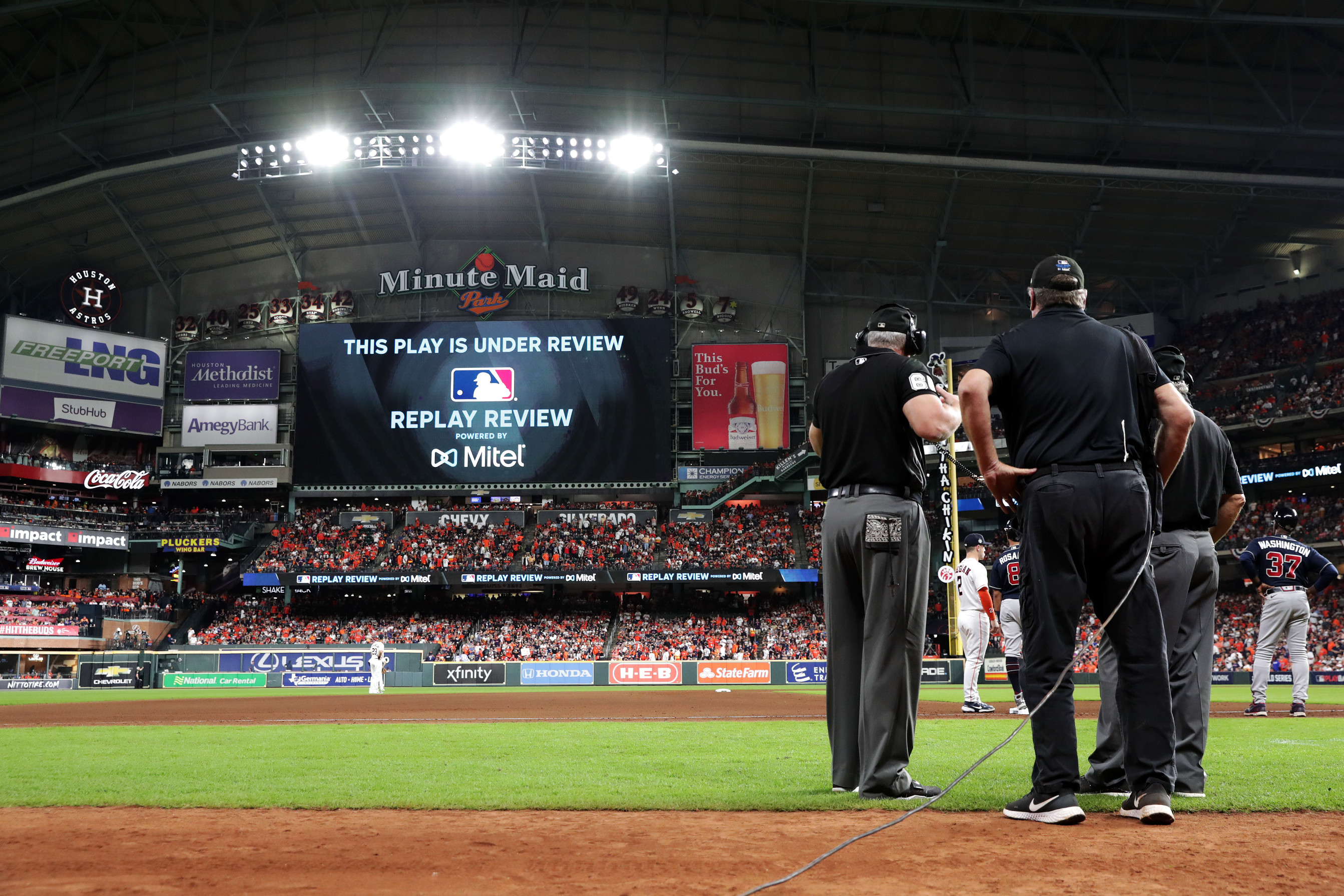 MLB umpires may get on-field microphones to explain replay review