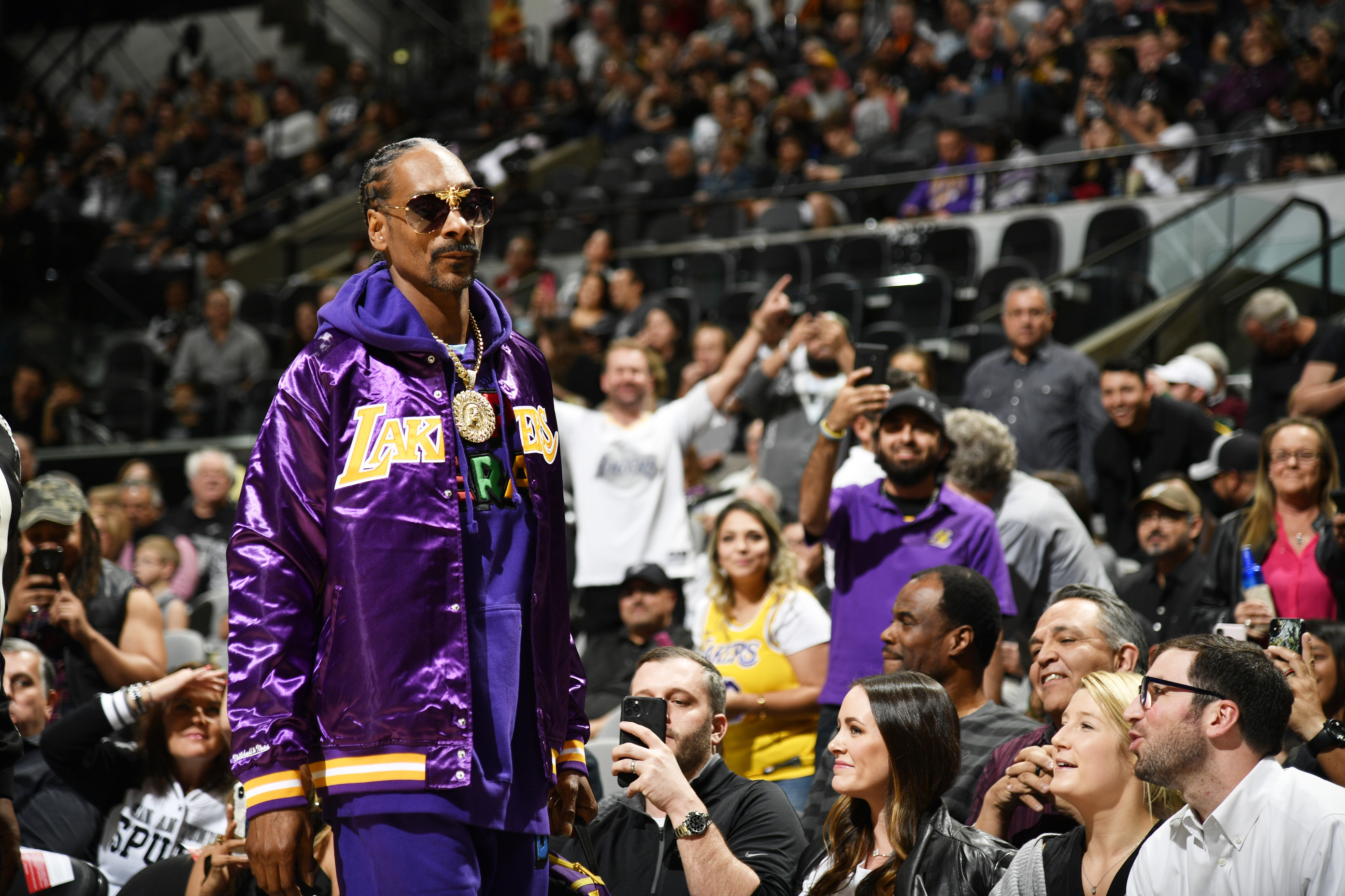 Snoop Dogg arrives at the Staples Center to watch Los Angeles Lakers vs the  Chicago Bulls basketball game. Finally back from the lockout that nearly  shut down the entire NBA season, the Bulls pulled out an 88-87 victory in  their 2011-2012 opener game