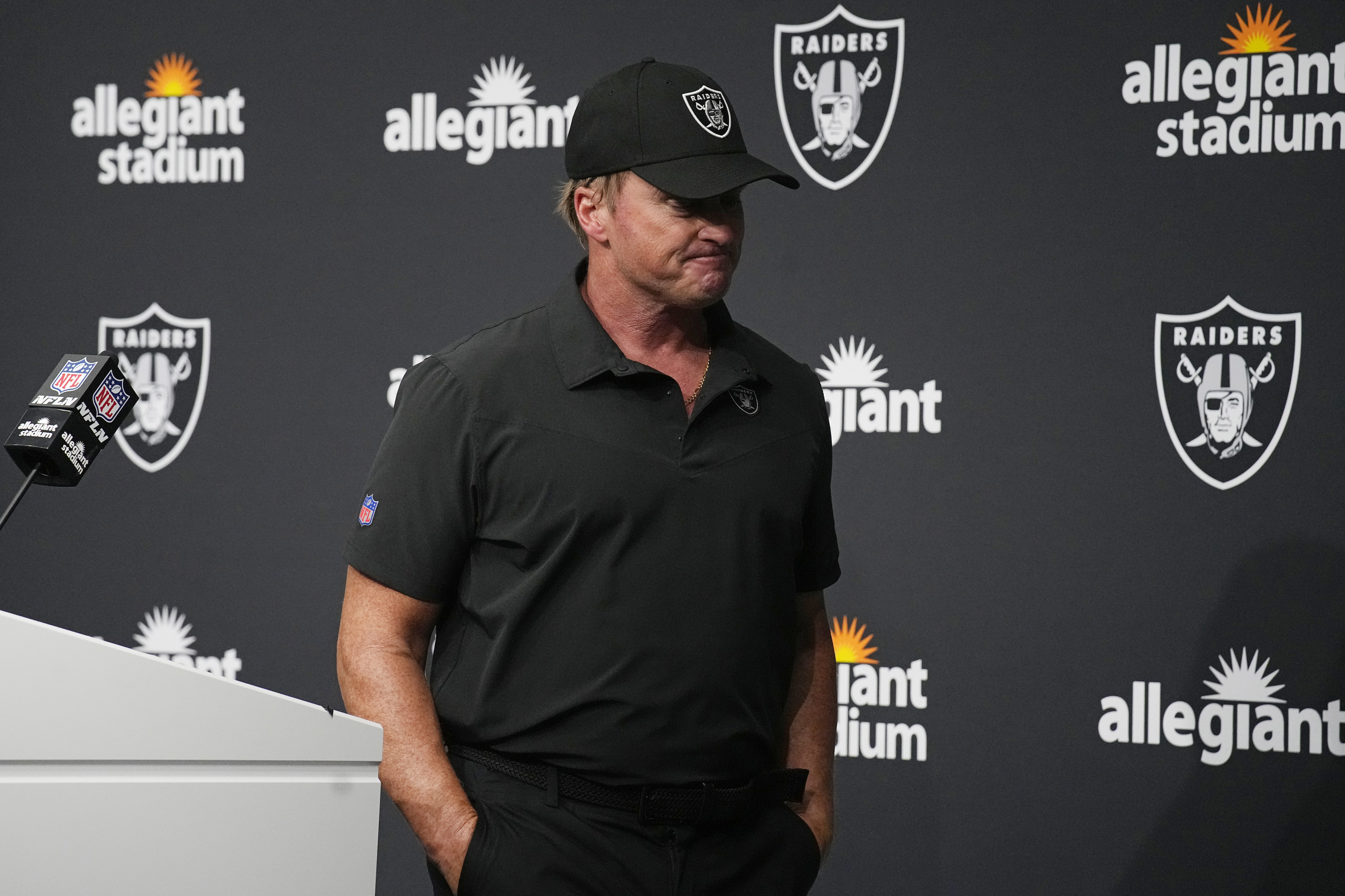 Head coach Jon Gruden of the Tampa Bay Buccaneers shakes hands