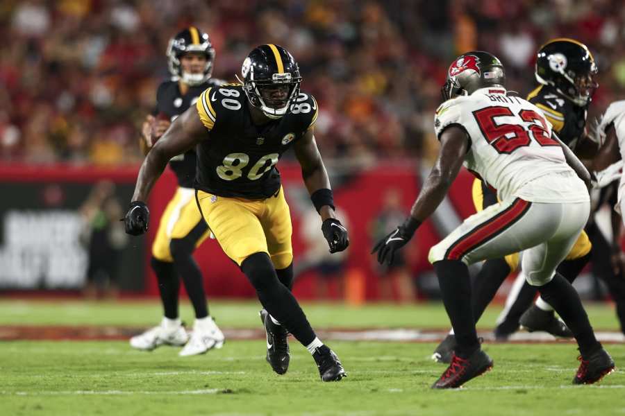 Pittsburgh Steelers tight end Darnell Washington (80) waits a the offensive  line for the snap during an NFL preseason football game against the Tampa  Bay Buccaneers, Friday, Aug. 11, 2023, in Tampa