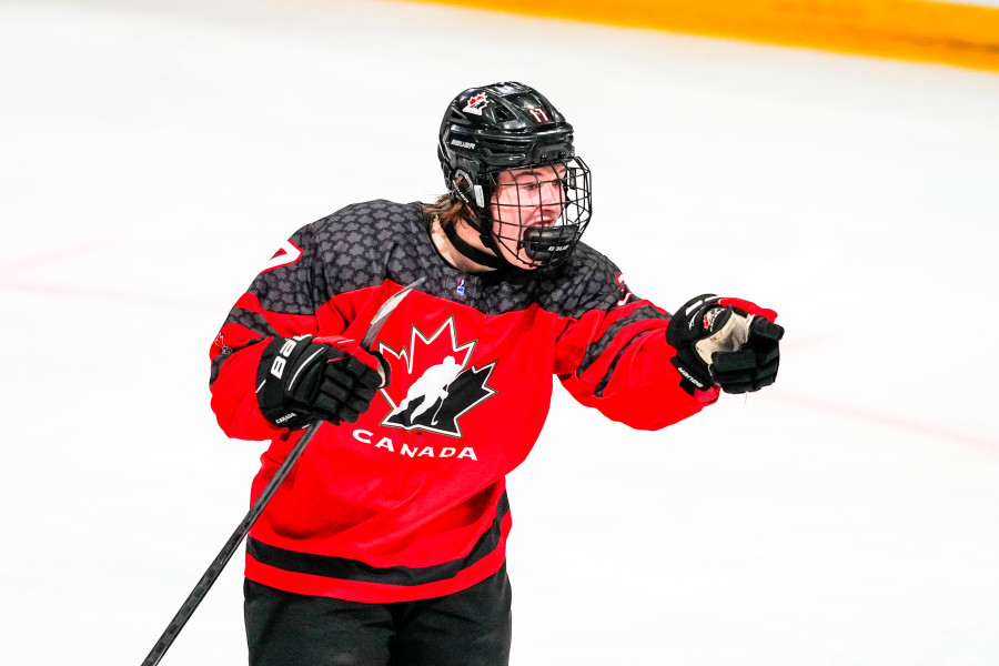 Lane Hutson in a Boston University jersey : r/Habs