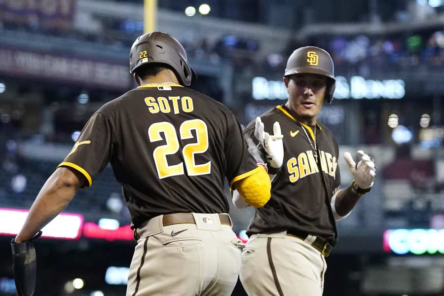 Chicago Cubs' Edwin Rios, left, and Matt Carpenter during the