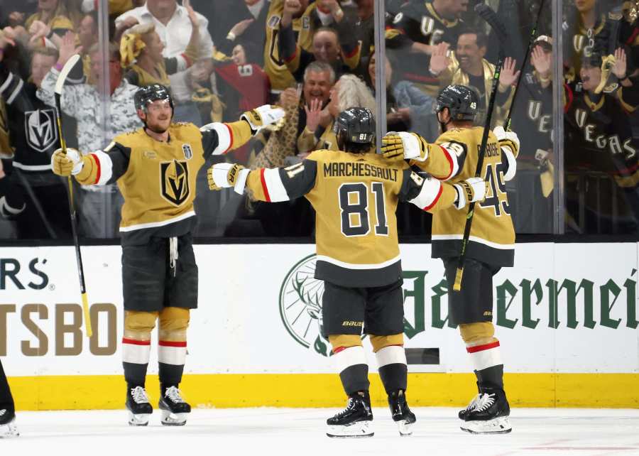 Alex Ovechkin receives mini trophies for winning Stanley Cup and being  named playoff MVP