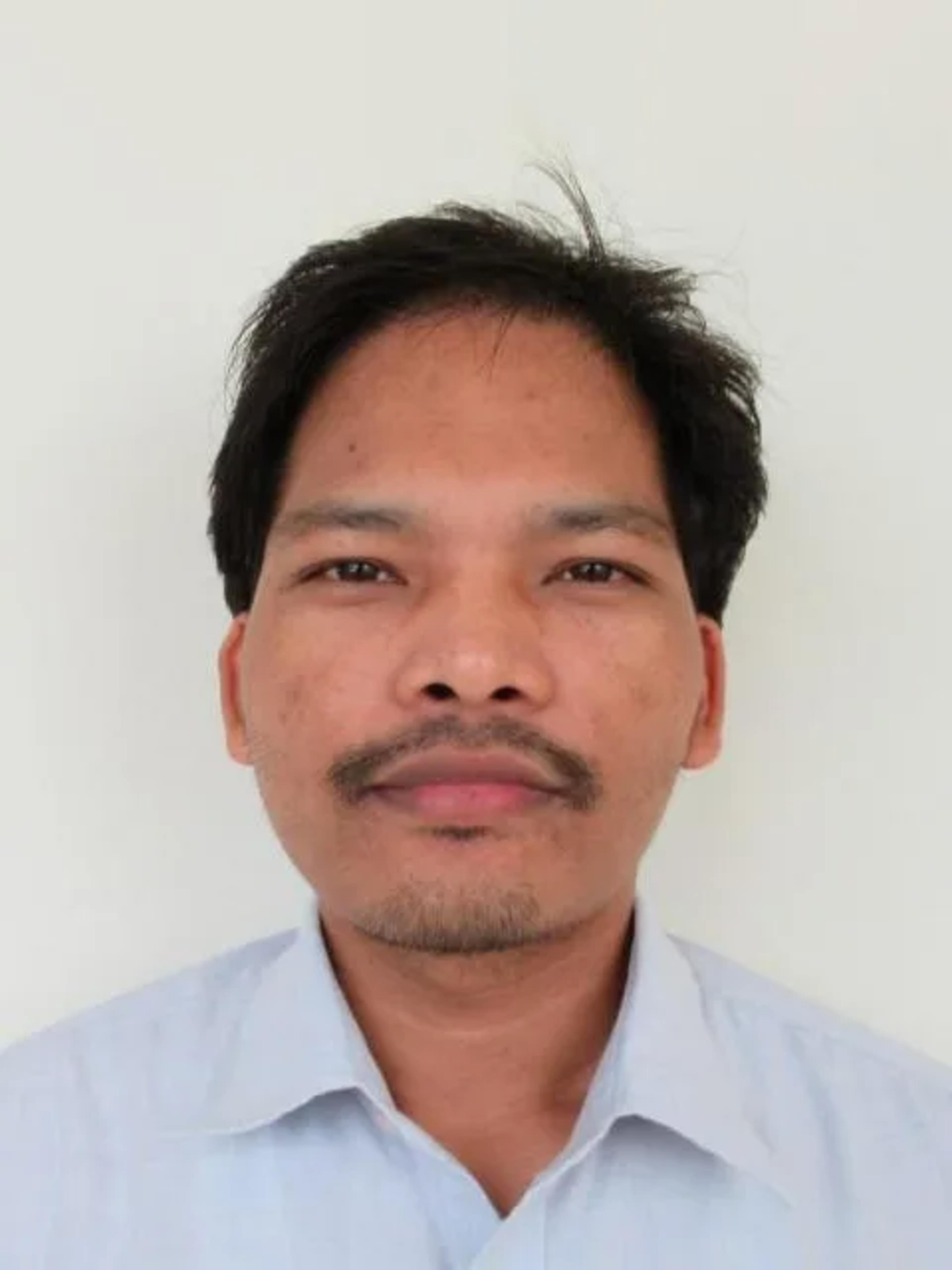 Portrait of Dipak Tharu