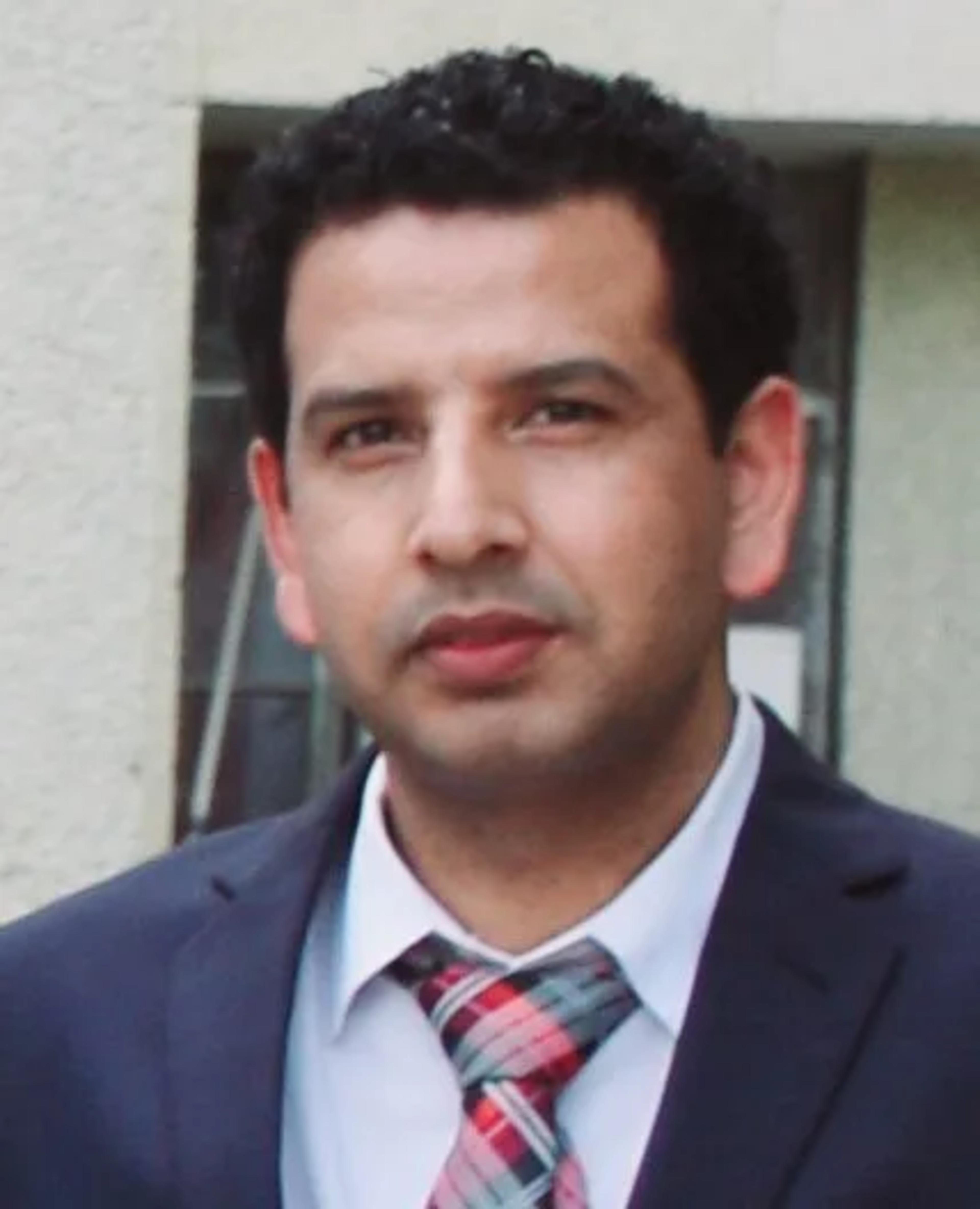 Portrait of Dr. Firdous Ahmad Malik