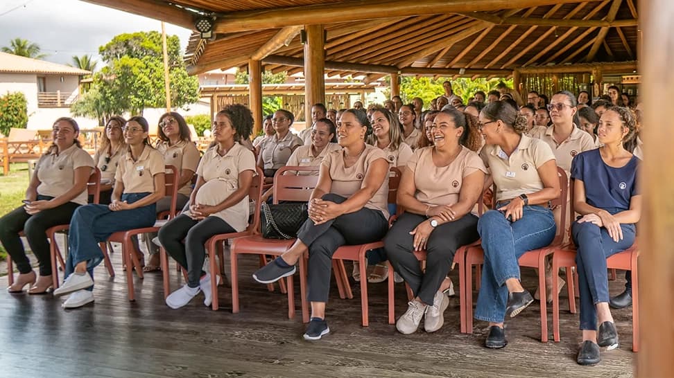 Equipe do Grupo La Torre reunida durante atividade interna.