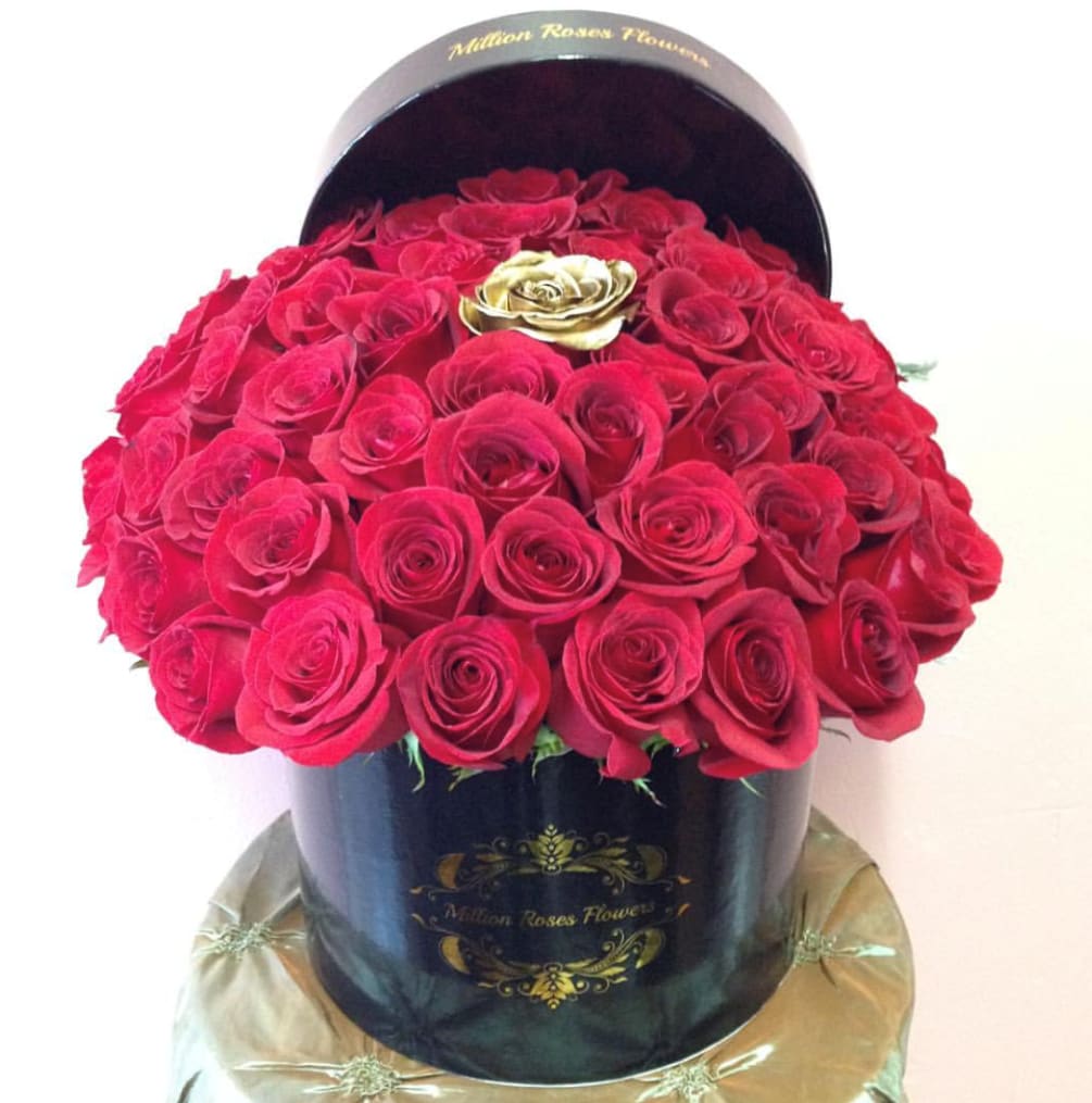 Red Roses With Gold In Middle In Round Black Box
