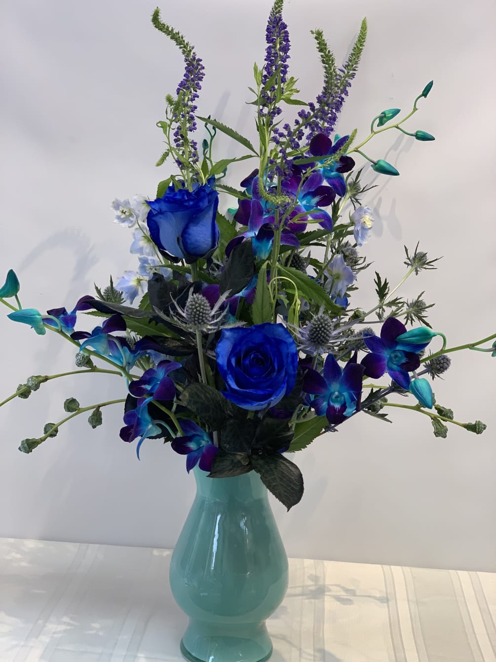 Teal, Blue Floral arrangement. W663 by Fillmore Florist San Francisco
