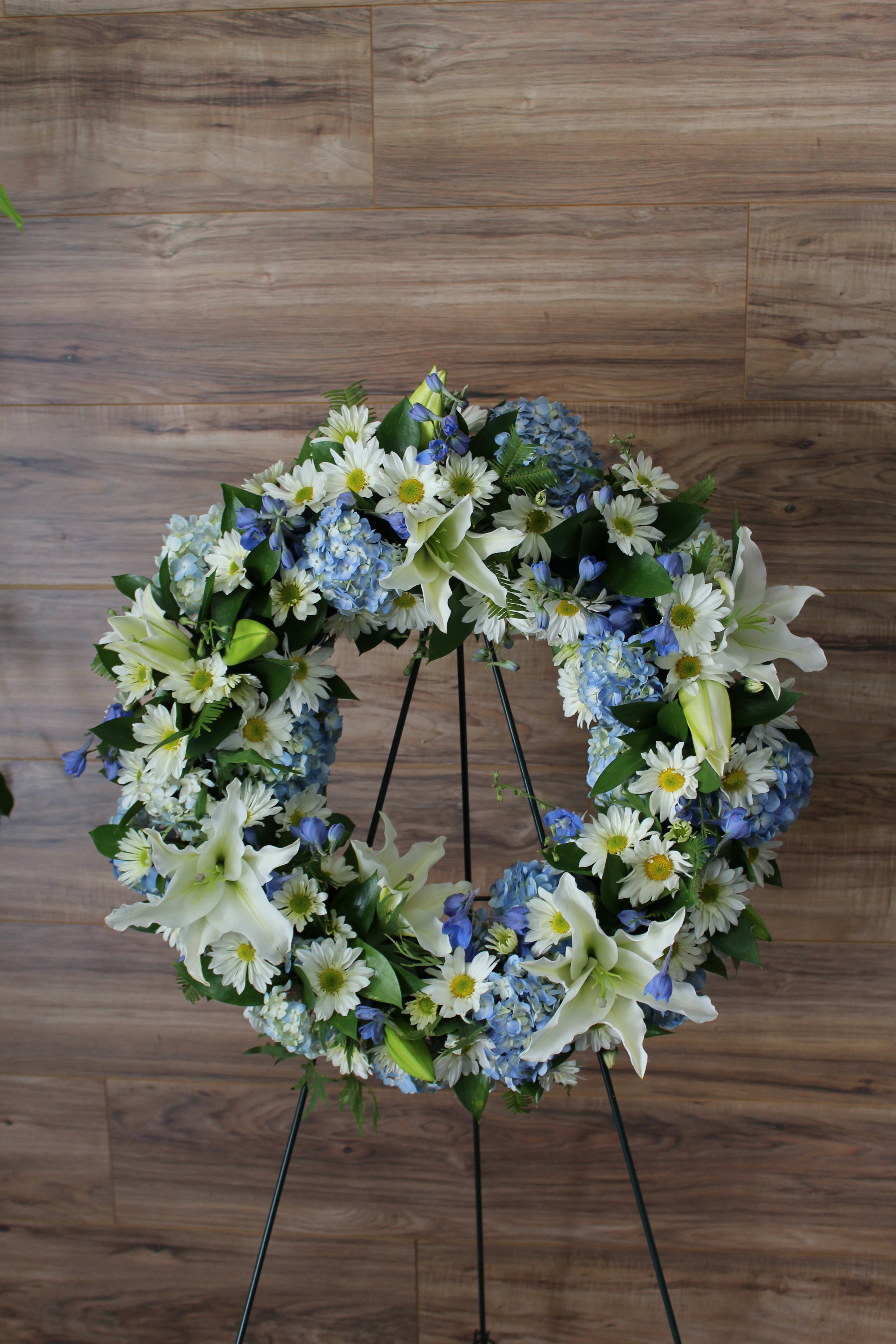 Blue And White Funeral Wreath In San Diego Ca Genesee Florist