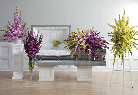 Green And Purple Gladiola Casket Spray Standing Spray Large
