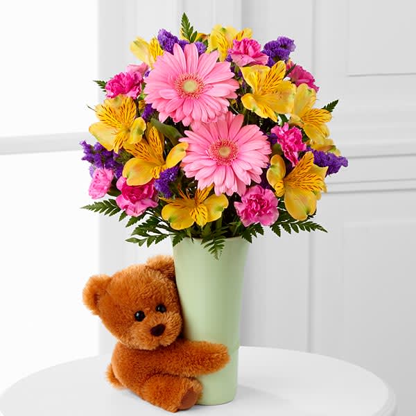 beautiful flowers with teddy bear