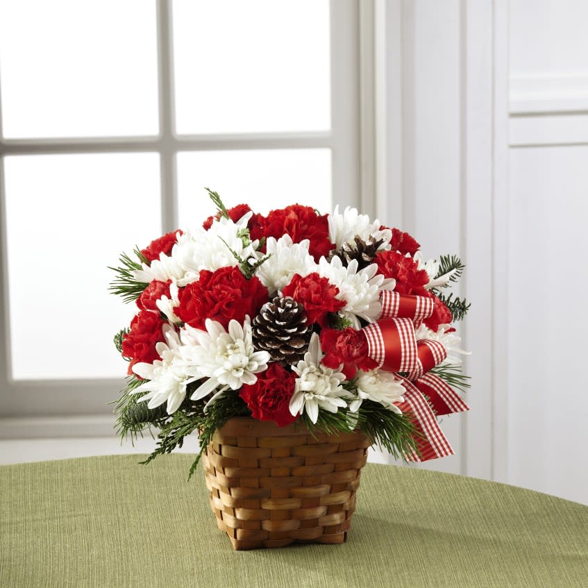 christmas flower arrangements in baskets