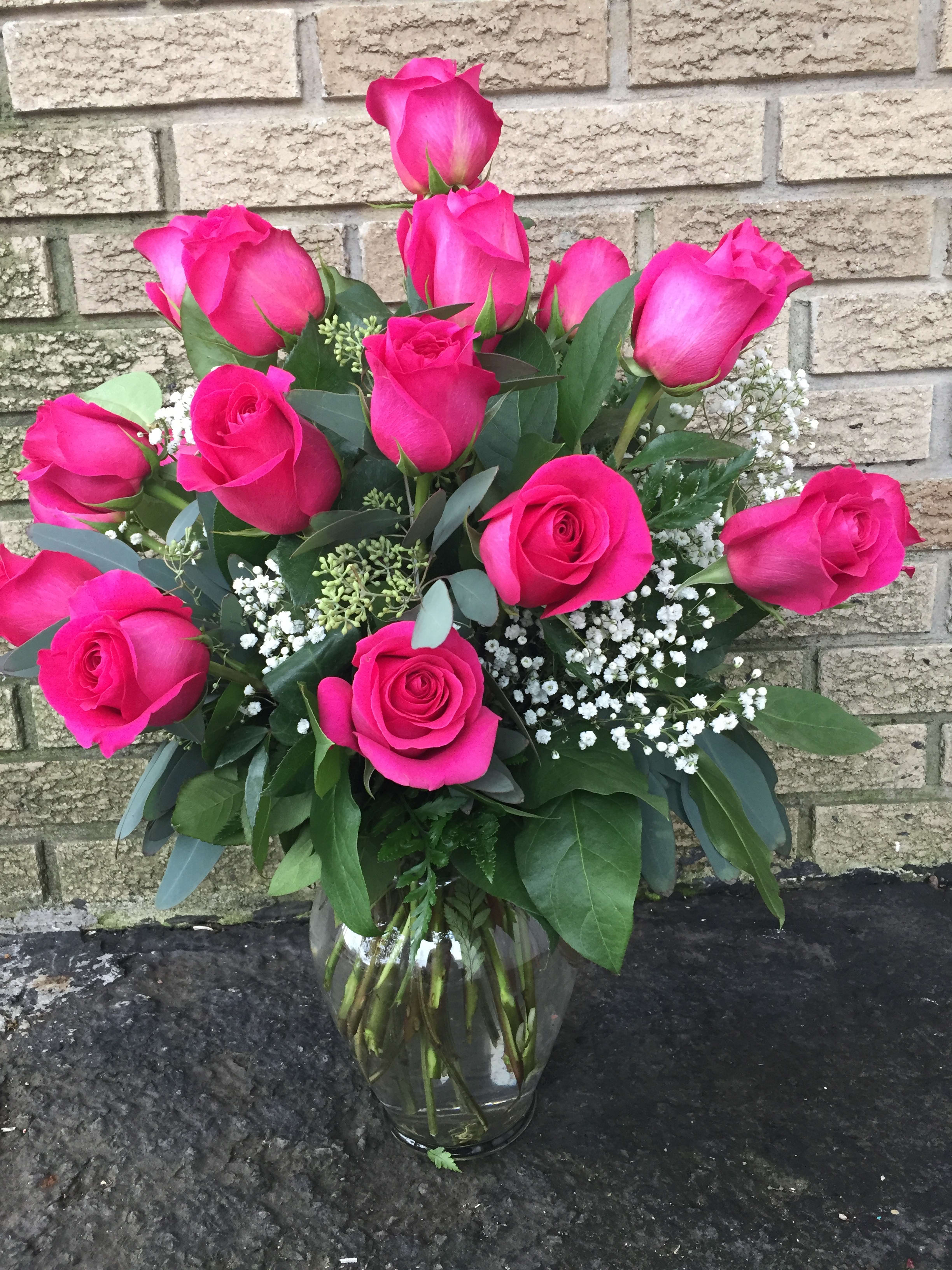 Dozen Hot Pink Roses By Landmark Florist