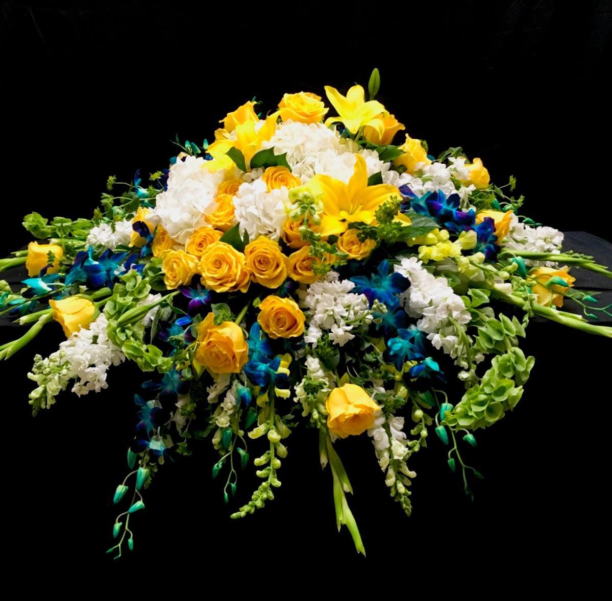 Vibrant Casket Spray in Shelbyville, TN Flowers For Keeps