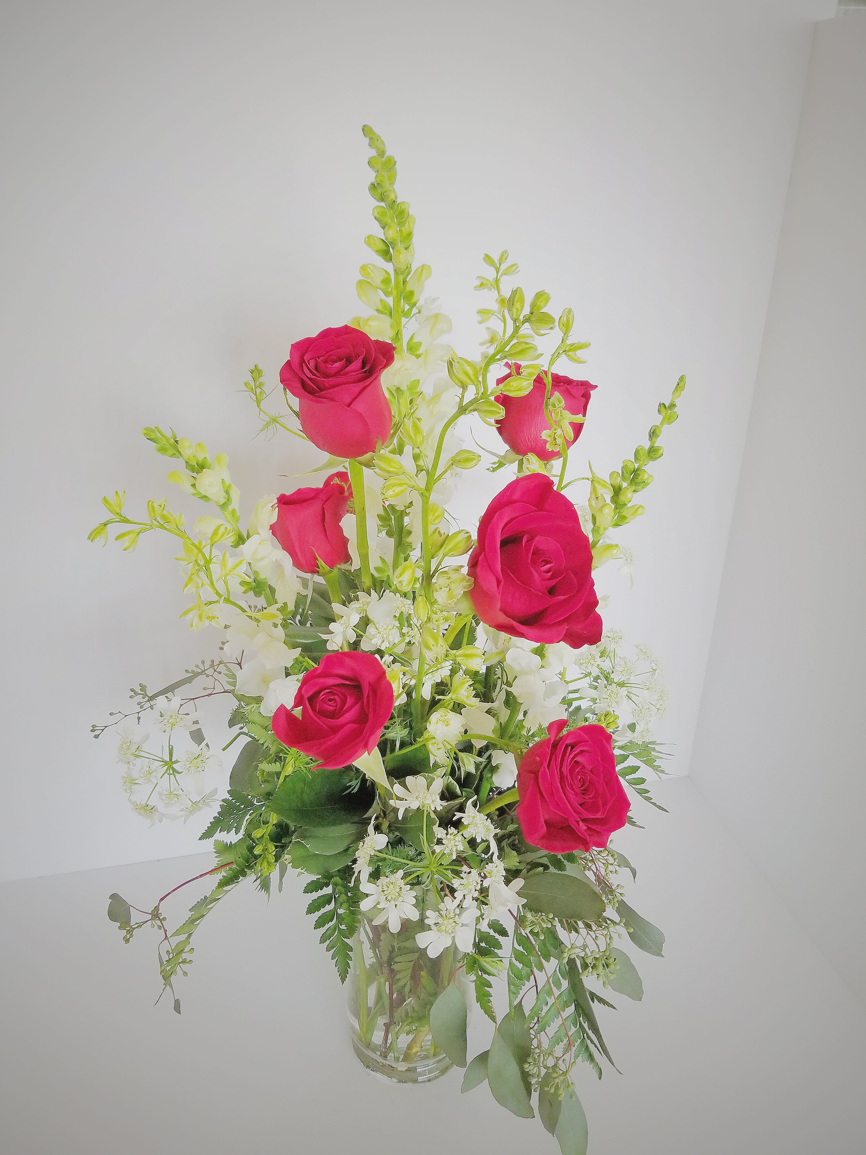 half dozen roses in