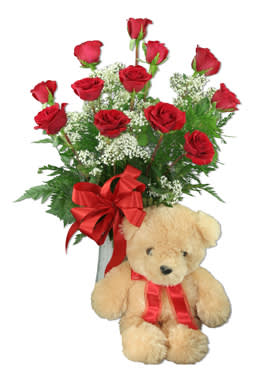 roses and a teddy bear