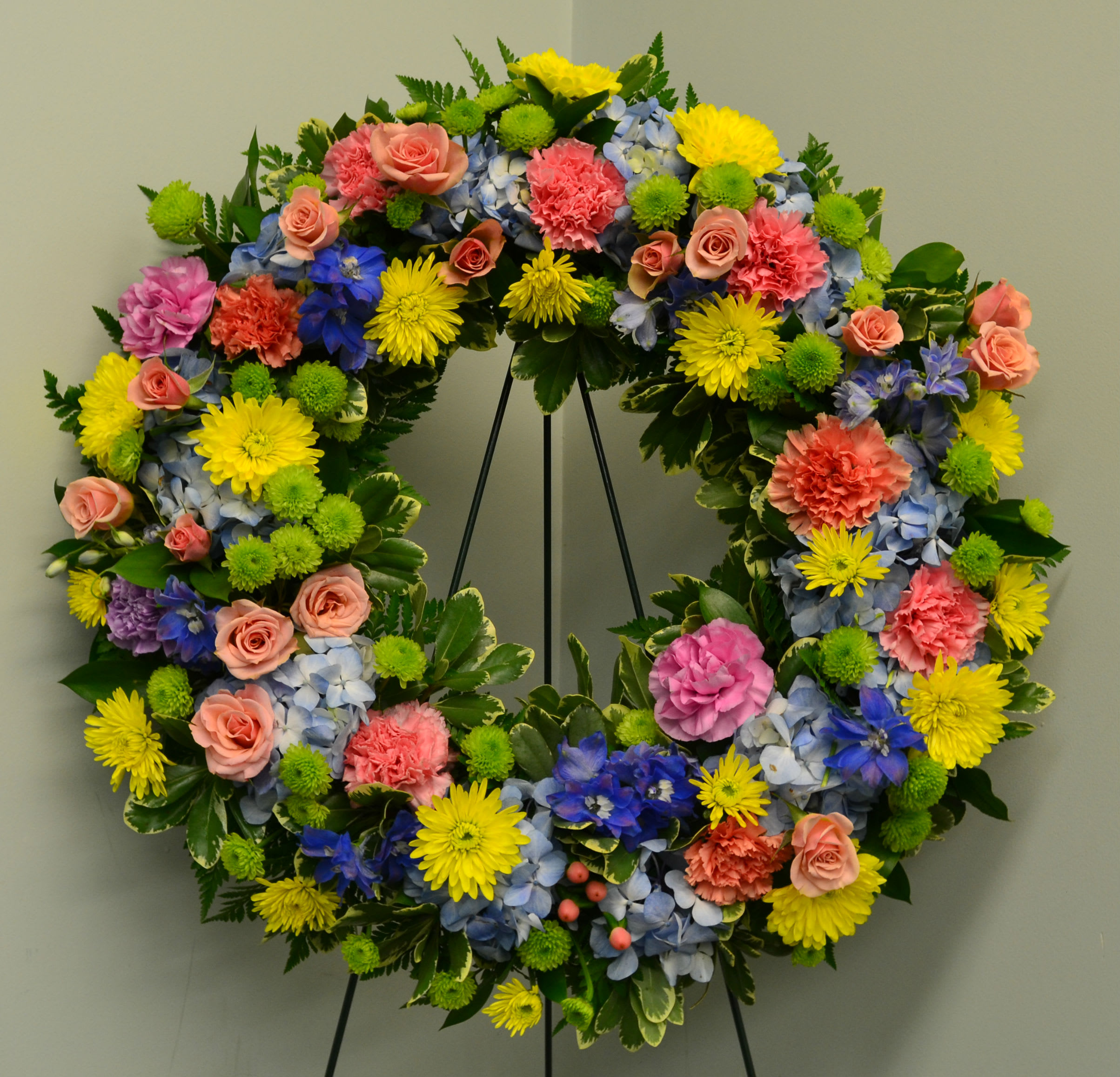 Evans Vibrant Blooms Funeral Wreath in Peabody, MA | Evans Flowers