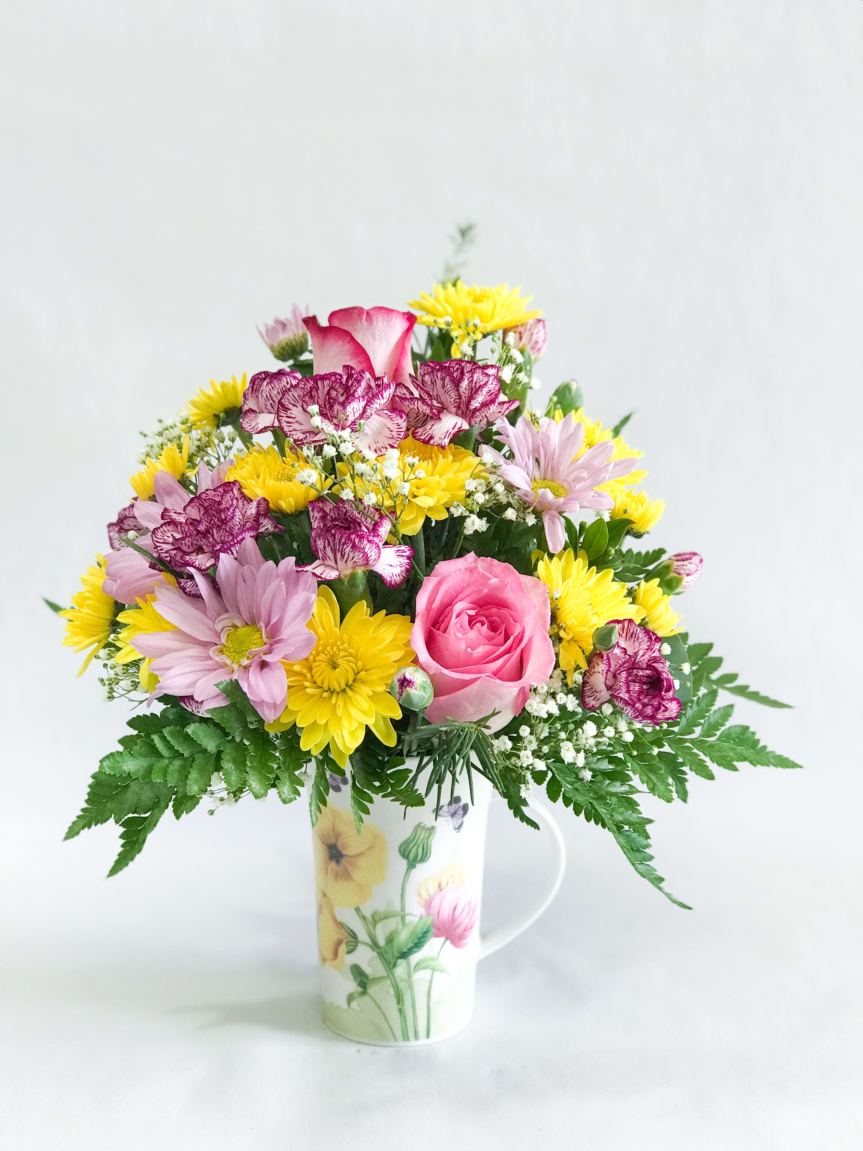 cup of flowers by