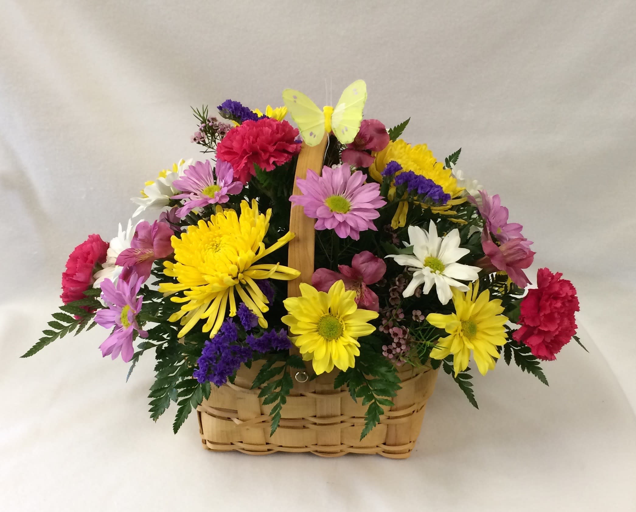 Blooms and Butterfly basket in Charleston, IL Noble Flower Shop