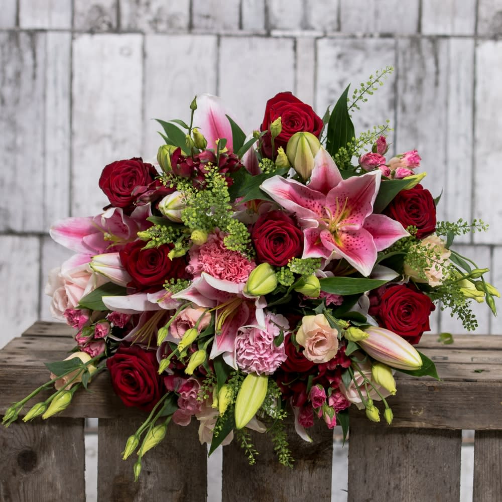 red pink bouquet in los angeles ca brendas flowers flower bouquet brown paper