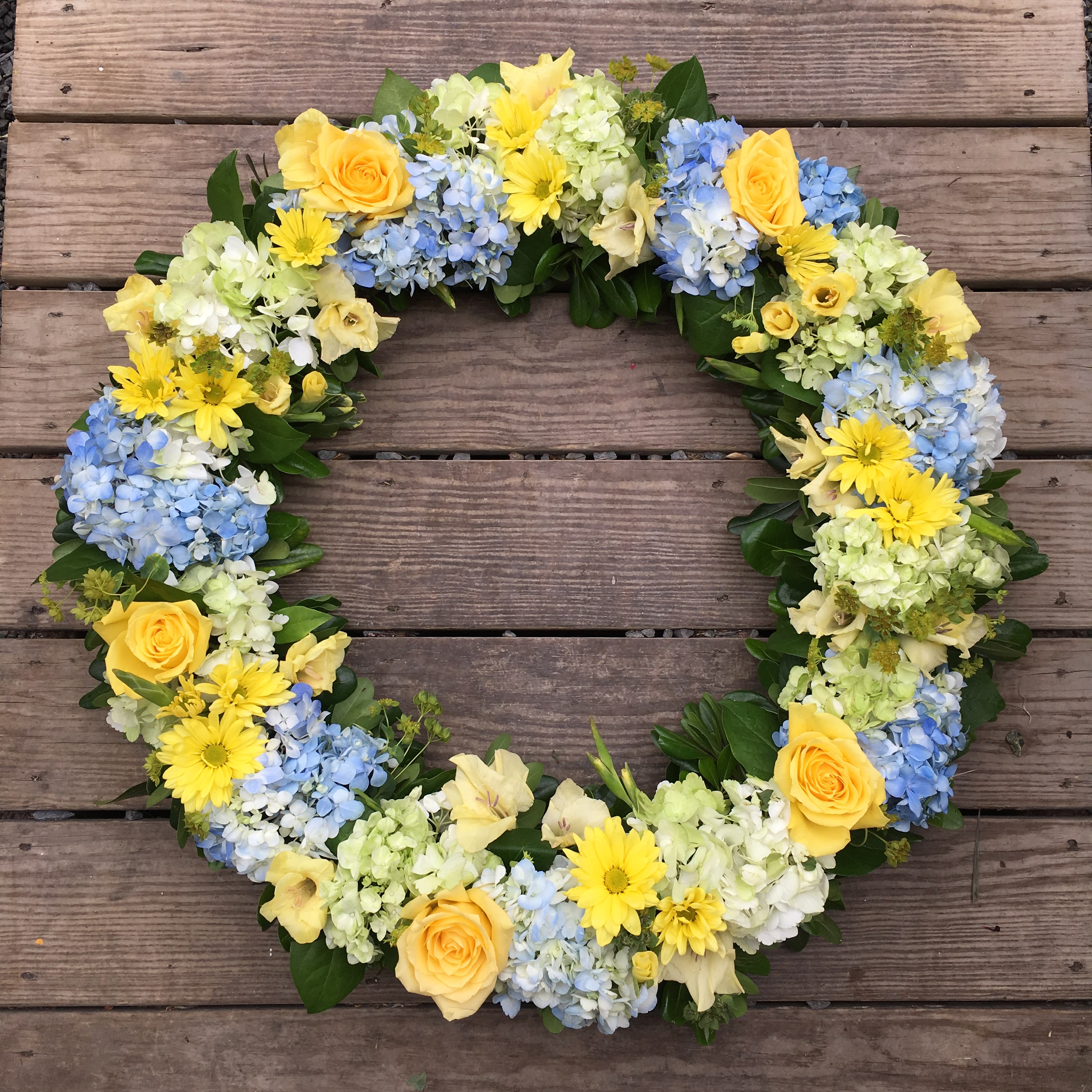 Evans Blue Yellow Green & White Funeral Wreath in Peabody ...