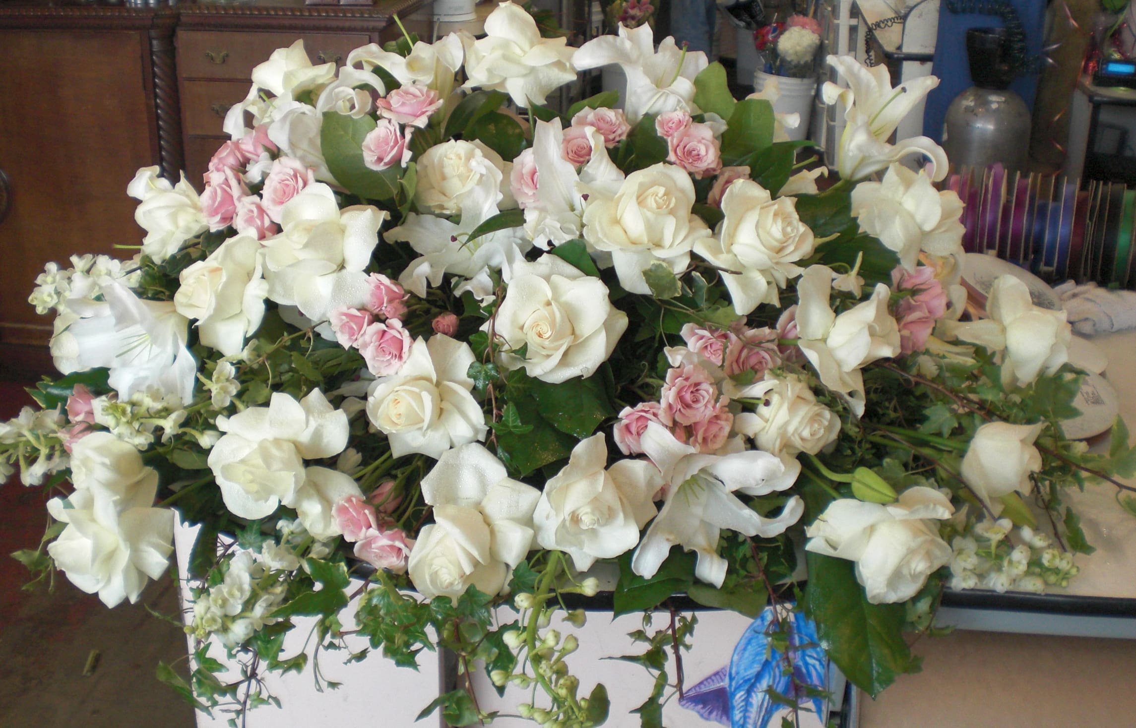 Soft blush funeral blanket in Los Angeles, CA Floral Design by Dave's