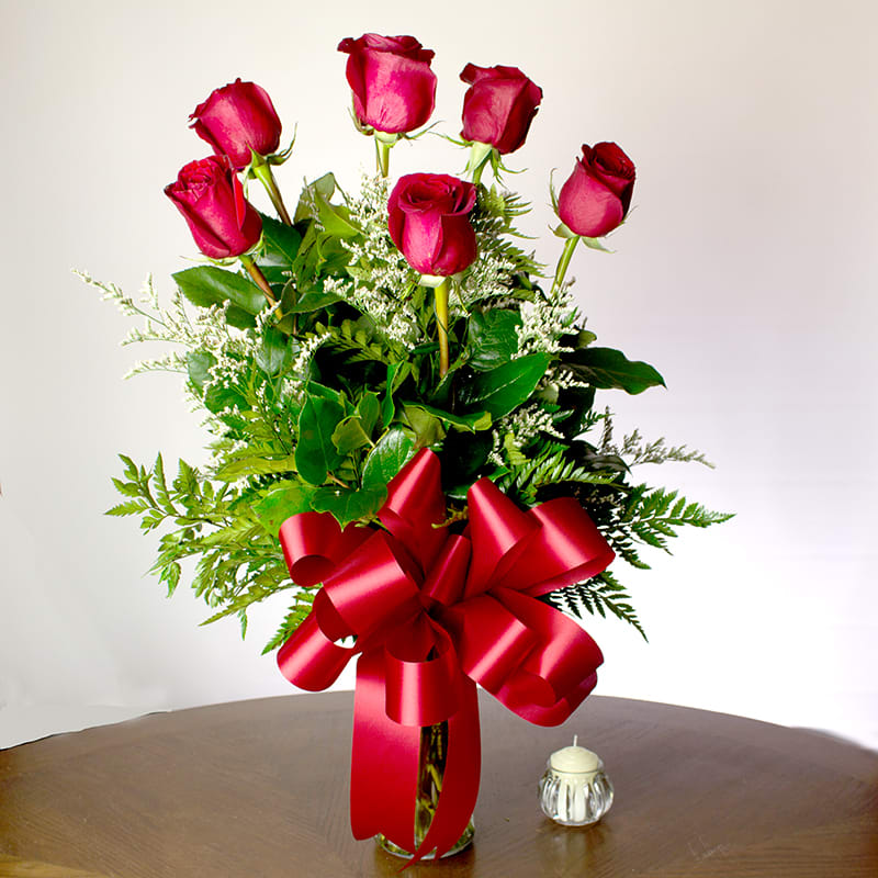 half dozen roses in