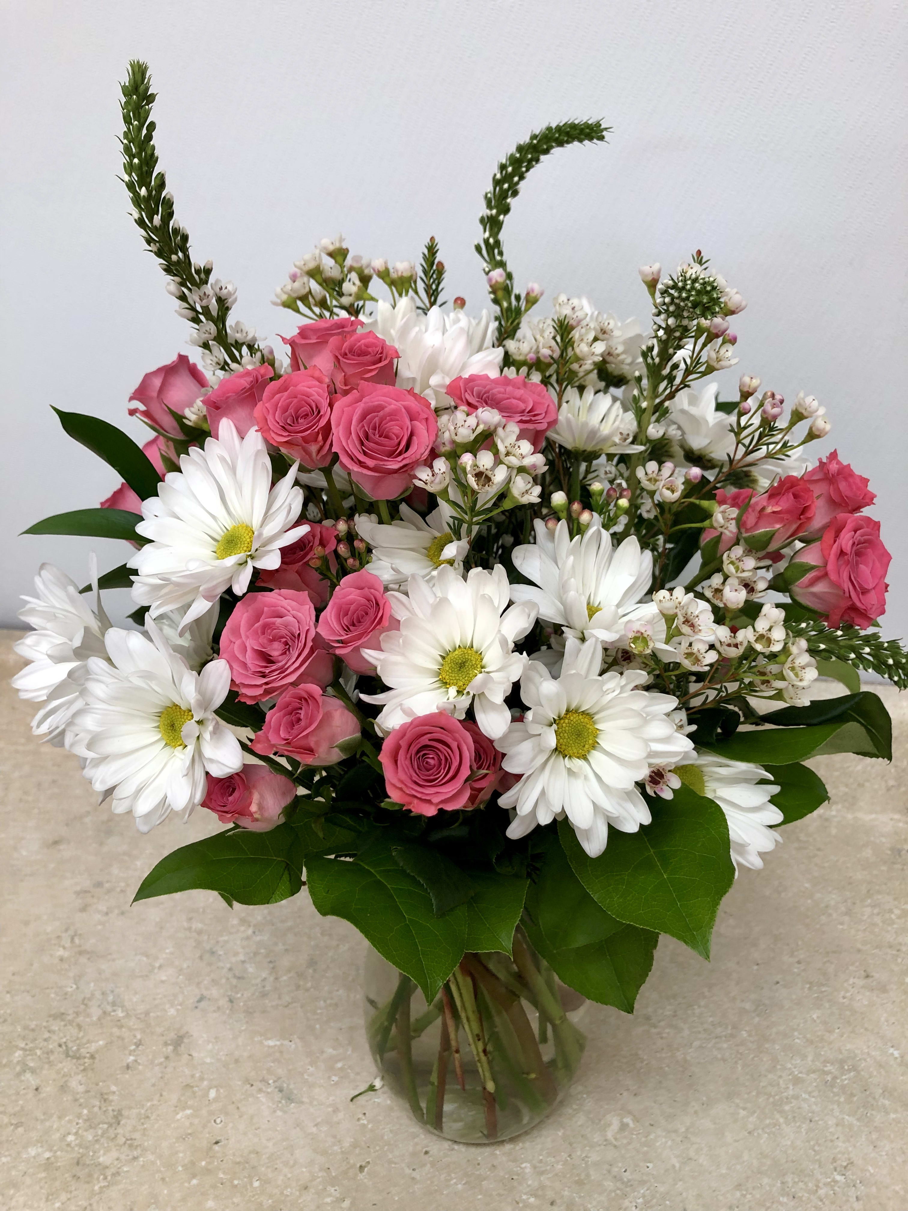 white daisies and spray
