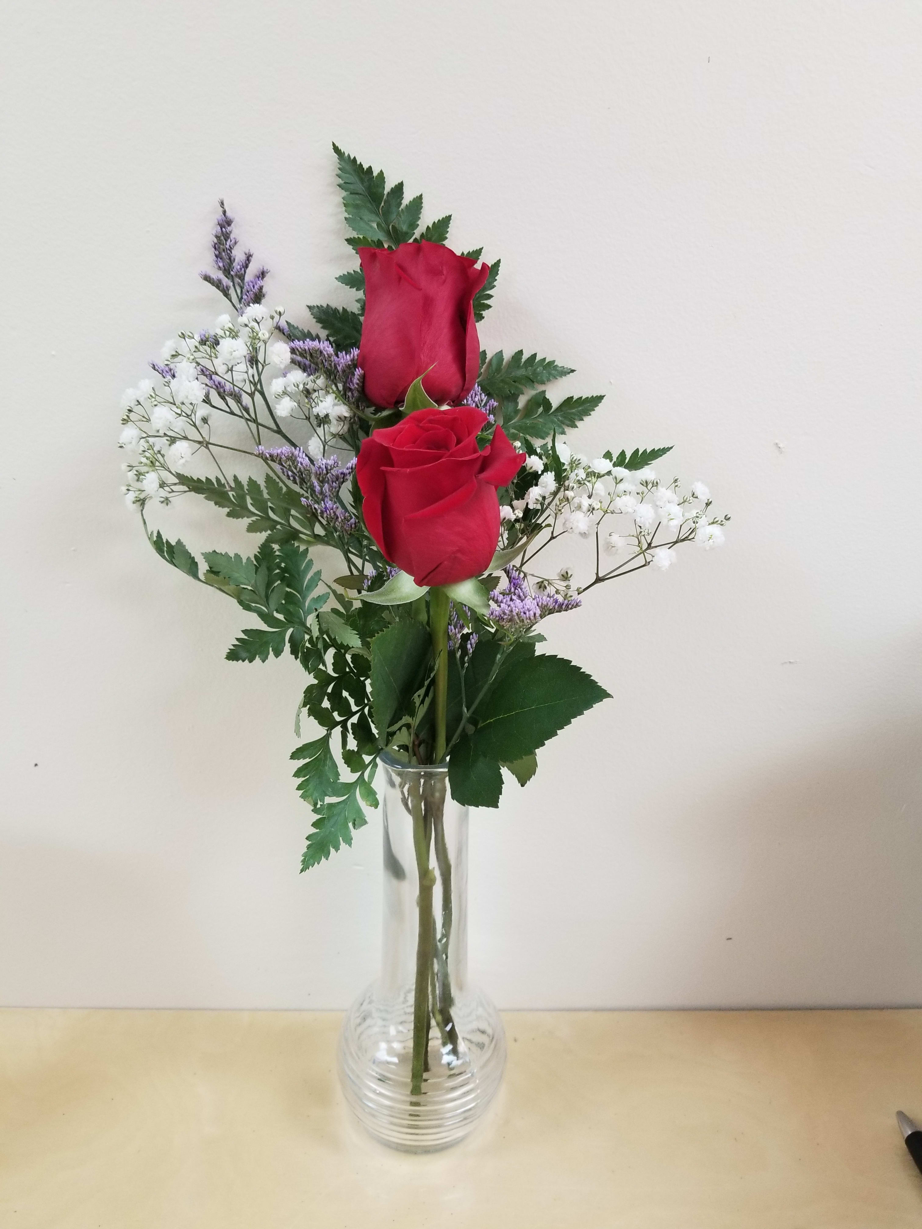 2 Red Roses In A Vase In Levittown Ny Gabriela S Garden Florist